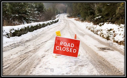 road-closed-sign-country-roads-closed-because-of-snow-D2F24J